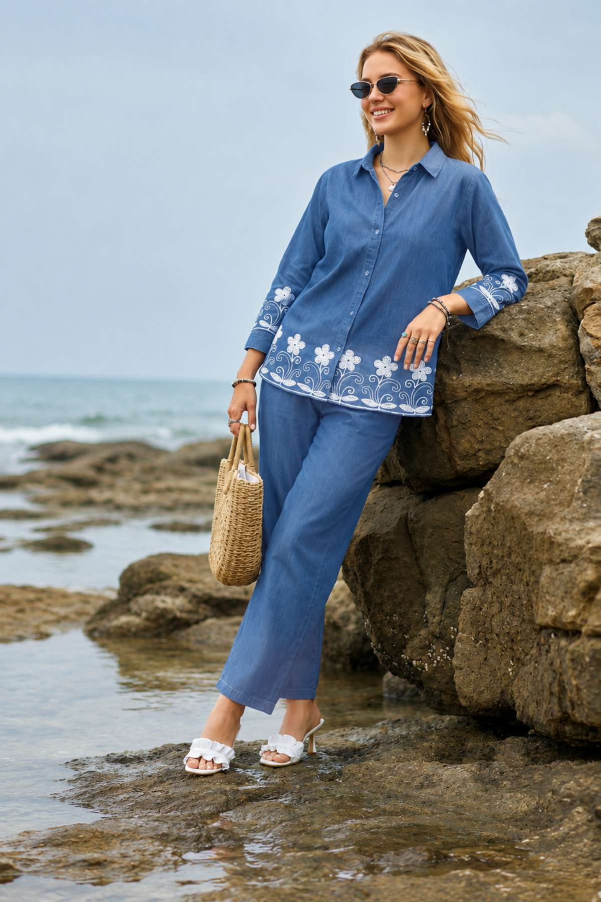 Coastal denim blue co-ord set with white floral embroidery, button-down top and matching full-length pants