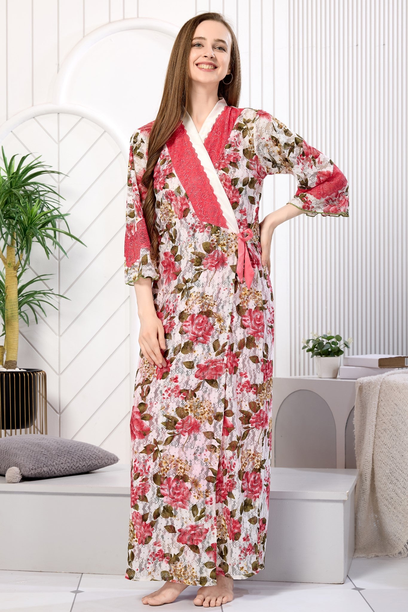 Woman posing in pink floral net robe with hand on hip - Gemini Nightwears