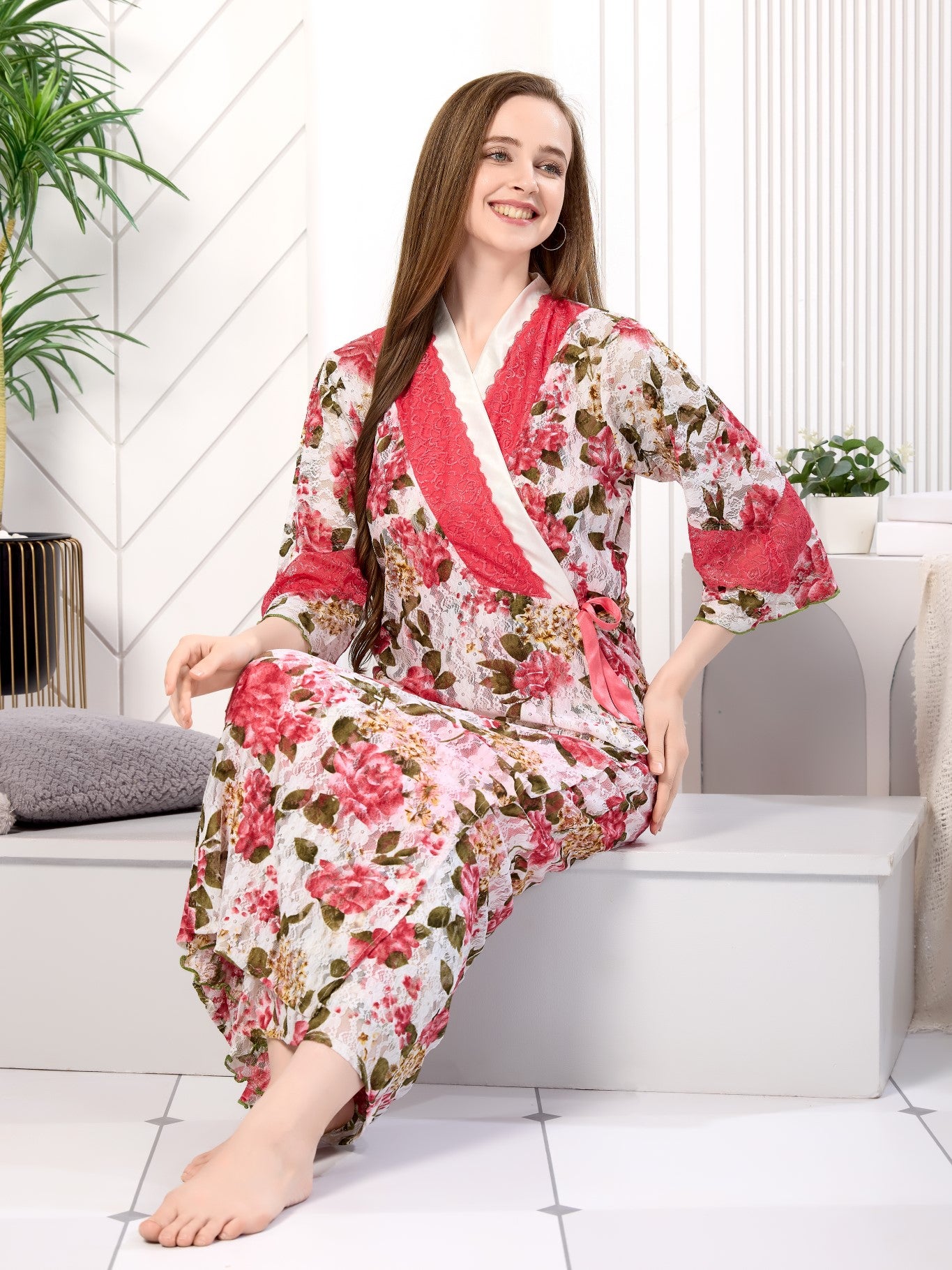 Woman sitting in pink floral net 2-piece nighty and robe set - Gemini Nightwears