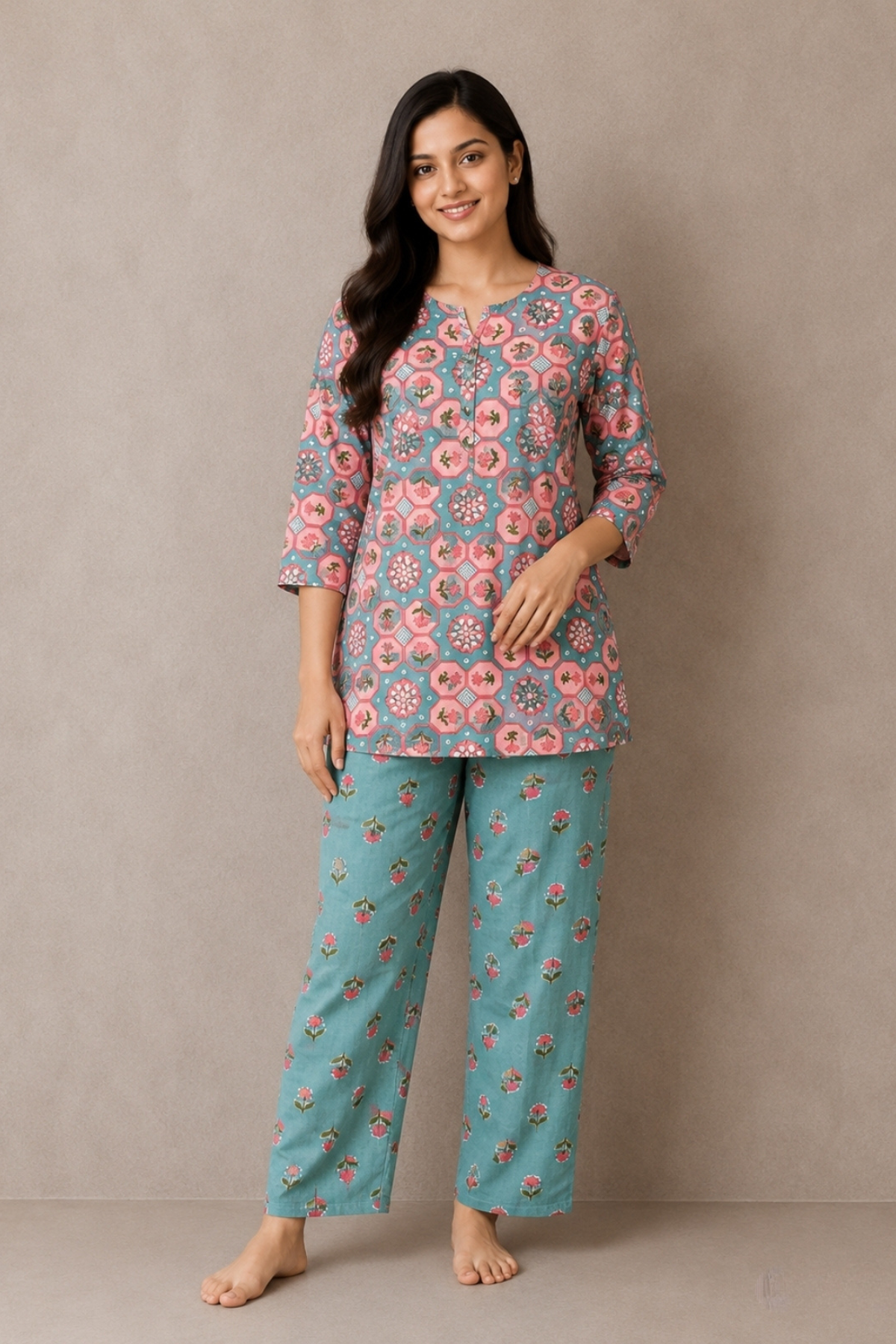 Woman wearing teal and pink octagonal medallion print co-ord set - Gemini Nightwears
